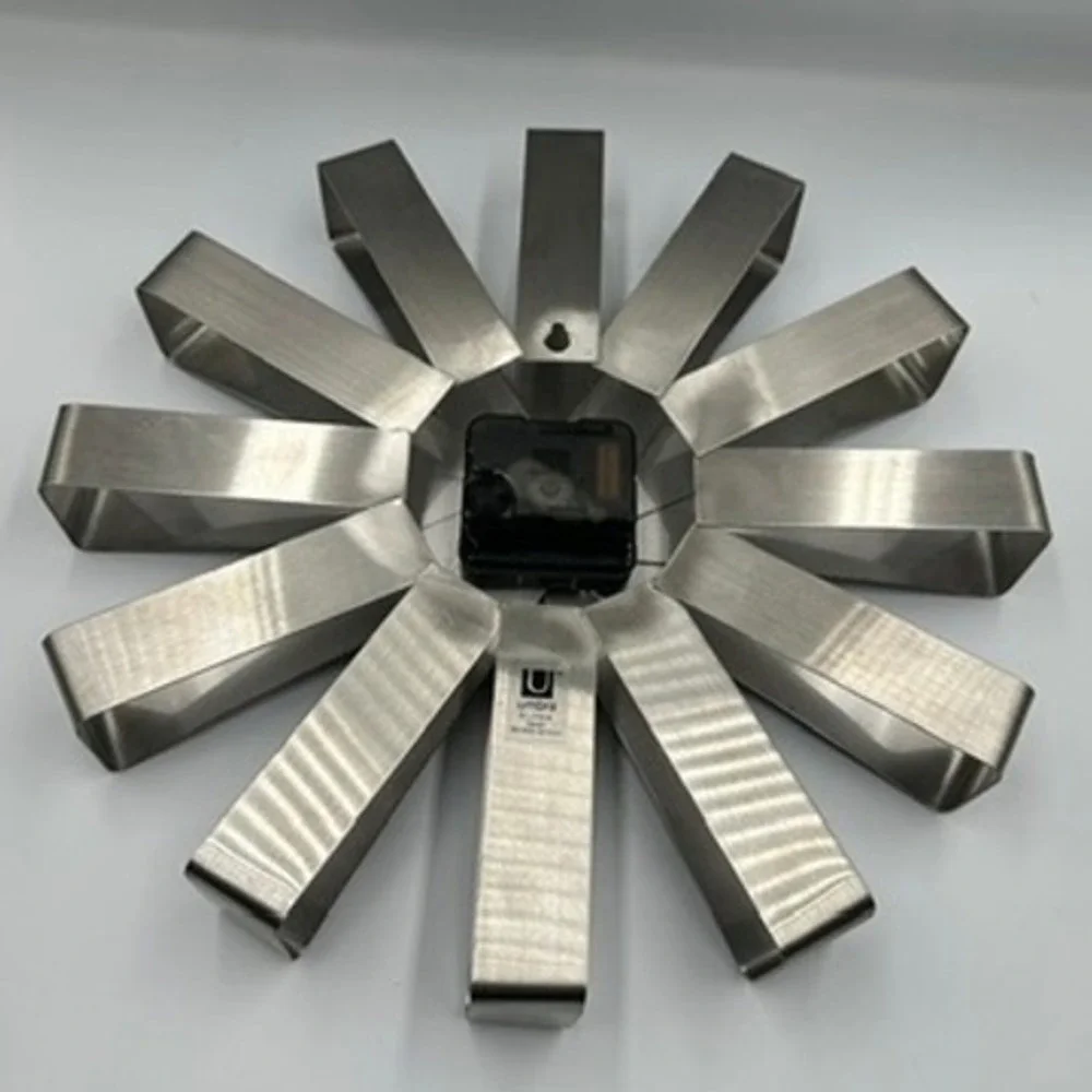 UMBRA wall clock by Michelle Ivankovic stainless steel ribbon sweep Seconds 12